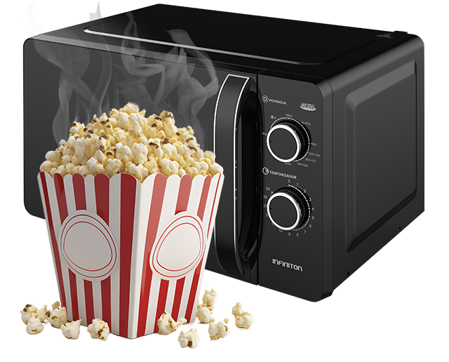 Microondas de fondo, con un paquete de palomitas delante Microondas de fondo, con un paquete de palomitas delante